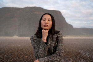 woman self reflecting on beach image by pikisuperstar on freepik